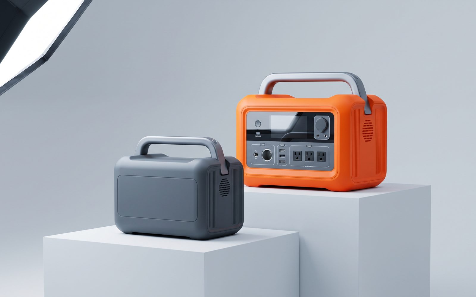 Orange portable power station on white plinths